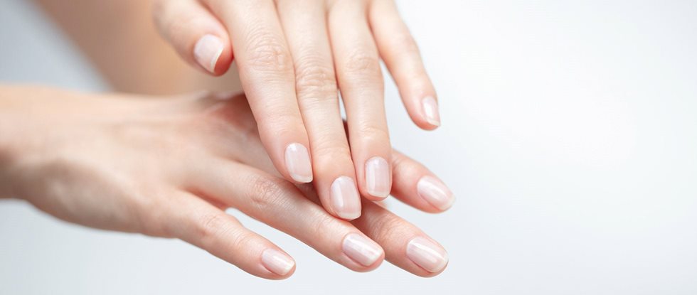 Cracked skin is common on fingers, hands and feet